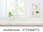 Free space table top background on blurred kitchen window interior