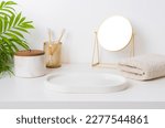 Small photo of Empty tray on bathroom table with various hygiene eco accessories