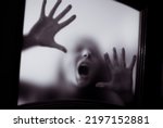 Small photo of scary picture of hands behind glass, horror ghost woman behind door, Halloween concept