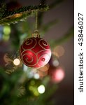 Photo of Single red bauble hanging on a Christmas tree | Free christmas ...