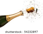 Close-up of explosion of champagne bottle cork