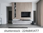 Modern living-room with wall and built in TV