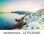 Small photo of beautiful details of Santorini island, sunset over Oia village coast line, Santorini island, Greece, pamorama with Aegan sea with sunshine