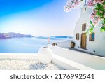 Small photo of beautiful details of Santorini island - typical house with white walls and blue Aegan sea Greece