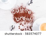 coffee break concept - cups of espresso, spoons and coffee break lettering
