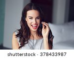 Casual brunette woman with headset, teeth smile, customer support from home, online job