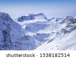 Ski lifts, runs and pistes on Rettenbach Glacier in Solden ski resort in Otztal Alps in Tirol, Austria. The place of the first World Cup giant slalom races in the winter season at the end of October