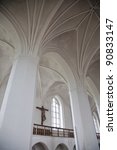 Small photo of Crucifix on the wall under the vaults of Maribo Cathedral.