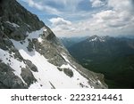 Hohe Tauern National Park. The famous Grossglockner mountain road leads through flowering alpine meadows and snow-covered mountains. Great spring trip to Austria. Snow in May
