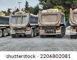 Dump Trucks At A Road...