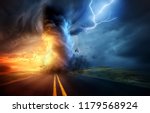 a dramatic storm at sunset... | Shutterstock . vector #1179568924