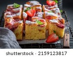 Fresh and hot strawberry cake made of strawberries and mint. Vegan fruit sponge cake.
