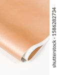Small photo of leather material imitation leather close-up texture edge corner macro front side wrong side color light brown beige