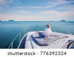 beautiful woman enjoying luxurious yacht cruise, sea travel by luxury boat