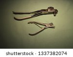 Small photo of Metal emasculator for castrastion of pigs and bulls