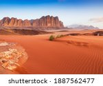 Wadi Rum Desert, Jordan. The red desert and Jabal Al Qattar mountain.