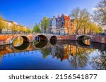 Amsterdam, Netherlands. The Keizersgracht (Emperor's) canal and bridges in the morning.
