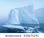 The glaciers are melting on arctic ocean in Greenland. Big glaciers day by day broking and dangerous for world climate system. Shooting day was foggy weather and glaciers didn't look clear.