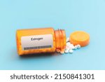 Small photo of Estrogen. Estrogen Medical pills in RX prescription drug bottle