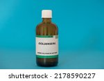 Small photo of Herbal tincture in a glass vial. Herbs medical solution of Goldenseal