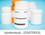 Small photo of Metronidazole is an antibiotic medication used to treat infections caused by bacteria and protozoa. It works by inhibiting the growth and reproduction of the microorganisms.
