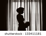 Silhouette Of A Girl At The...