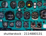 Small photo of Toggle switches old soviet helicopter mi2 many text on Russian language which translates Light danger Beacon Suspension Cargo Dump Tactical Emergency