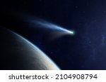Small photo of Đˇomet flying close to planet Earth. Comet flying through space close to the Earth planet. The concept of the apocalypse, armageddon, doomsday. Elements of this image furnished by NASA.