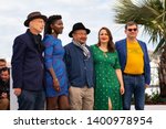 Small photo of CANNES, FRANCE - MAY 15, 2019: Jury Members Benoit Delhomme, Alice Diop, President of the Camera d'or jury Rithy Panh, Sandrine Marques and Nicolas Naegelen attend the Camera D'Or Jury photocall