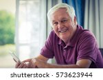 Portrait Of Smiling Senior Man...