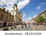 Small photo of WARSAW, POLAND - MAY 03, 2015: Holy Cross Church designed by the architect Joseph Simon Bellotti, built between 1679-1696 in Baroque style