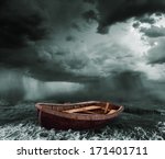 Old Boat In The Stormy Ocean