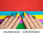 Colorful bright manicure with...