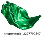 Small photo of Green cloth flutters in the wind. Isolated on white background