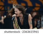 Small photo of New Orleans, LA - May 5, 2018: Aerosmith, with lead singer Steven Tyler, performs at the 2018 New Orleans Jazz and Heritage Festival.