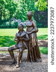 Small photo of Orange, VA USA - May 23, 2015: Bronze sculptures of US President and Founding Father James Madison and First Lady Dolley Madison on the grounds of their plantation home at Montpelier by StudioEIS