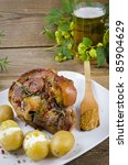 Small photo of Roasted pork knuckle./ Ham and bacon are popular foods in the west, and their consumption has increased with industrialisation.