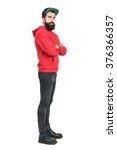 stock-photo-side-view-of-young-bearded-man-in-red-hoodie-wearing-baseball-cap-with-crossed-arms-full-body-376366357.jpg