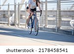 Small photo of A woman on bicycle and cycling rides are great tools for improving health of the muscles of the hip belt reducing weight and improving female libido improving psychological stability in lifestyle
