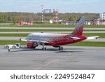Small photo of SAINT PETERSBURG, RUSSIA - MAY 20, 2022: Towage of Airbus A319-100 (RA-73212) of ROSSIYA - RUSSIAN AIRLINES in Pulkovo airport on a May sunny day