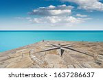 Stone Pier With A Compass Rose...