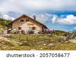 Small photo of Dobbiaco, Italy - Sept 7, 2021: Alpine mountain hut called Malga Grava Longa or Langalm Hutte, 2283 m., in front of Tre Cime di Lavaredo or Drei Zinnen, Trentino Alto Adige, Italy, Europe.