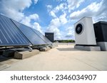 Small photo of Heat pump and solar collector on the roof