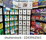 Small photo of HOKKAIDO, JAPAN - DECEMBER 23, 2022: Various brand of gift card selling in Japan mart store. A gift card is a prepaid card issued by a retailer to be used for purchases within a particular store.