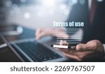 Small photo of Businessmen hold smartphone of Terms of use concept, online banking check budget planning concept banner for website header design, Terms of use business concept. Terms and conditions of contract.