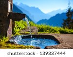 Water Spring On Alps Mountains...