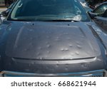 Dented car after a big hail storm