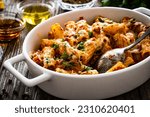 Small photo of Noodle casserole with minced meat, mozzarella cheese and vegetables on wooden table