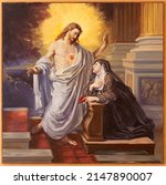 Small photo of BARI, ITALY - MARCH 3, 2022: The painting of apparition of Heart Jesus to St. Theresa of Avila in the church Chiesa di Sacro Cuore from 20. cent.