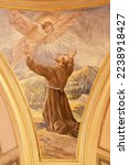 Small photo of VARALLO, ITALY - JULY 17, 2022: The fresco of Stigmatization of St. Francis of Assisi in the church Chiesa di sant Antonio by C. Secchi from 20. cent.